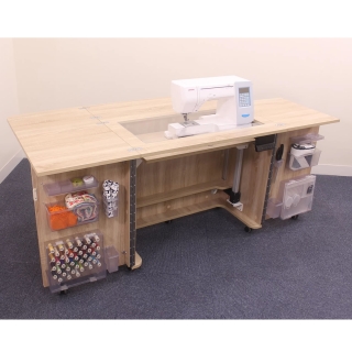 Geni-E is a compact cabinet to store a sewing machine and its accessories