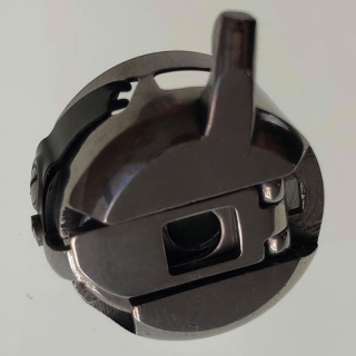 Husqvarna 213 bobbin case