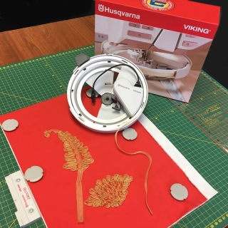 Showing the ribbon embroidery sewn on to the fabric
