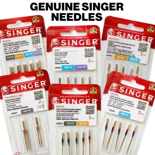 Various types and sizes of Singer universal sewing machine needles