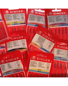 Various types and sizes of Singer universal sewing amchine needles